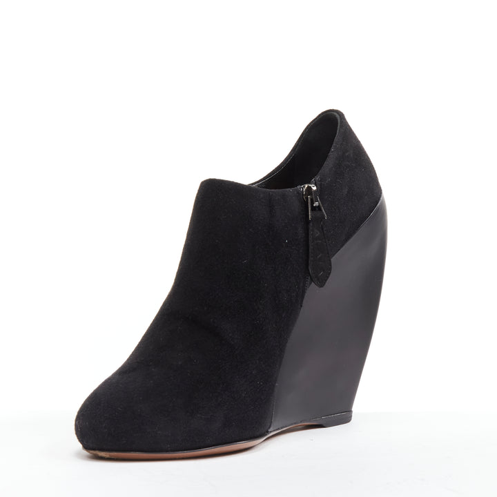 Female mannequin wearing Alaia by Azzedine Alaia Black Suede Women Boots in Size EU37 | Available at JHROP