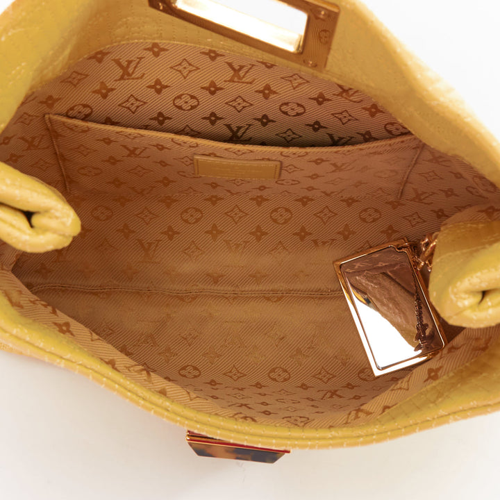 LOUIS VUITTON 2011 jaune Monogram Cuir Pochette Altair quilted leather clutch