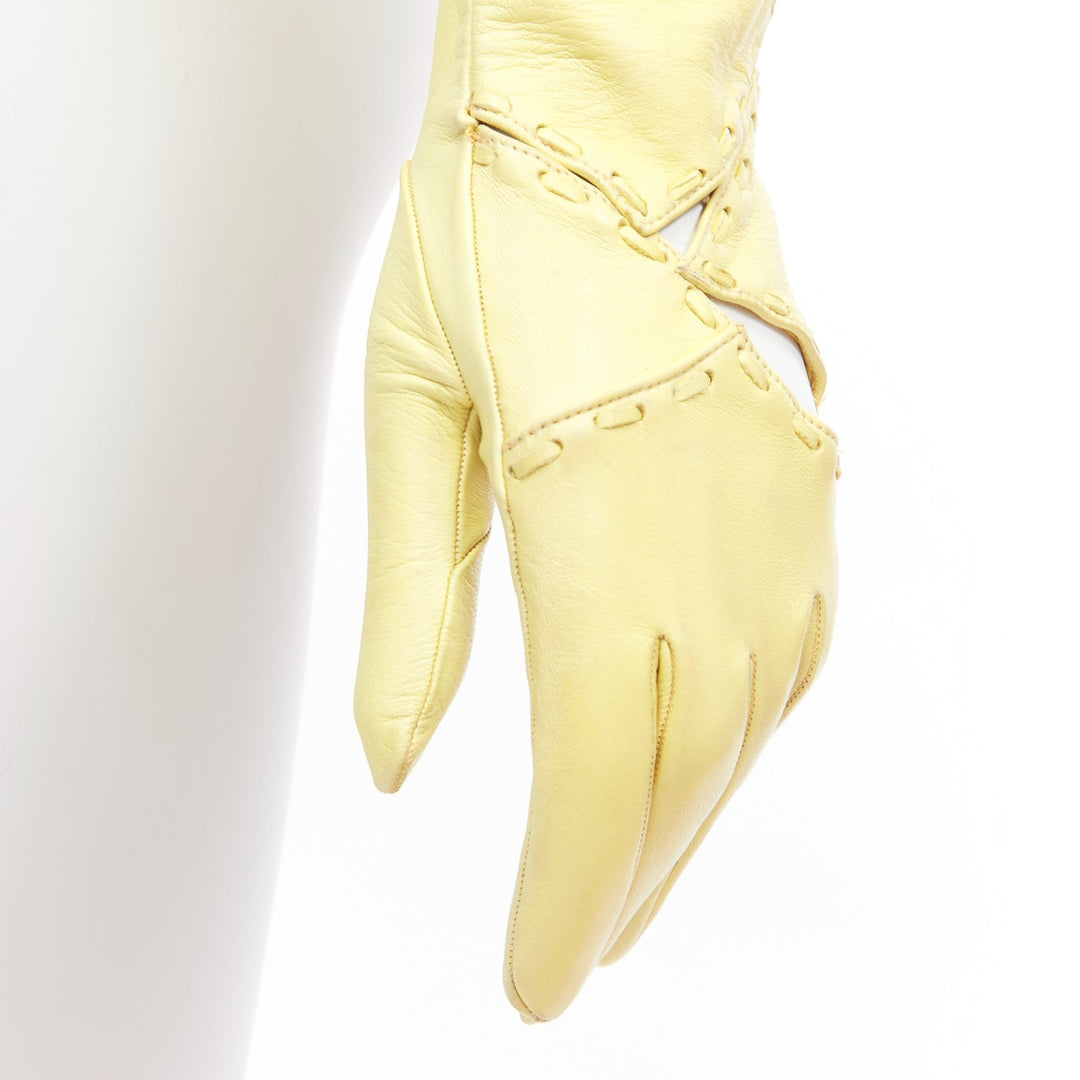 CLAUDE MONTANA Vintage yellow leather topstitch cut out gloves US7