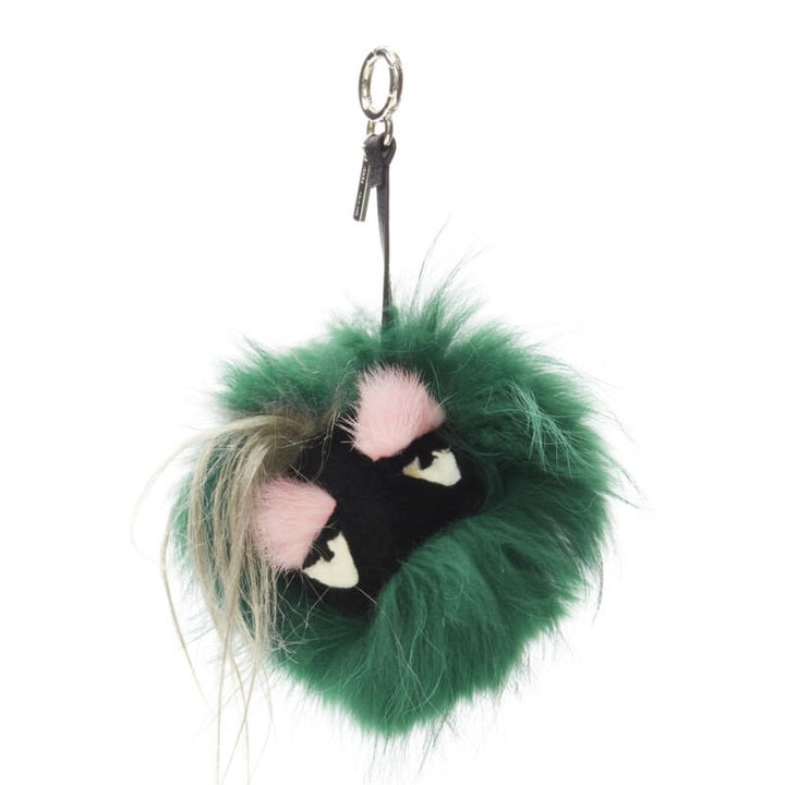  mannequin wearing Fendi Monster Bug Green Fur Key Chain in Size  | Available at JHROP