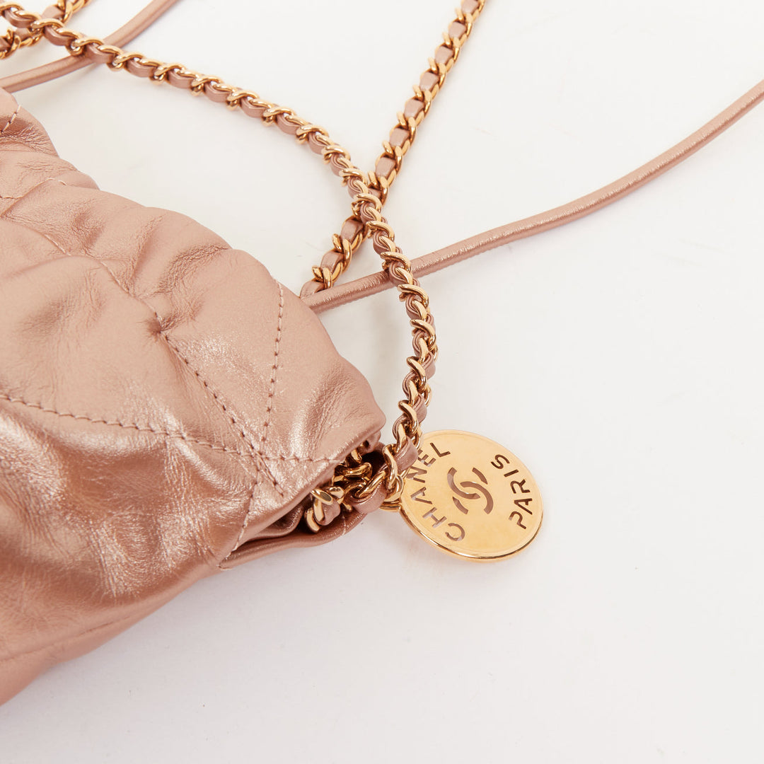 CHANEL 2023 Runway 22 Mini rose gold metallic calfskin leather drawstring bag