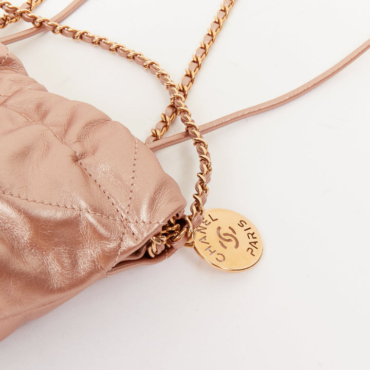 CHANEL 2023 Runway 22 Mini rose gold metallic calfskin leather drawstring bag