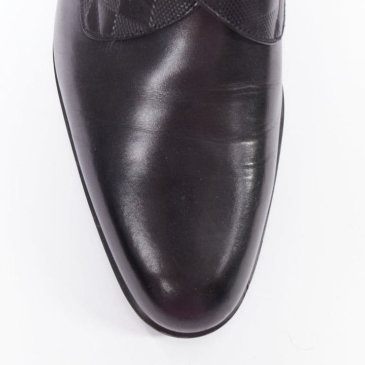 Male mannequin wearing Louis Vuitton District Black Leather Men Loafer in Size UK6.5 | Available at JHROP