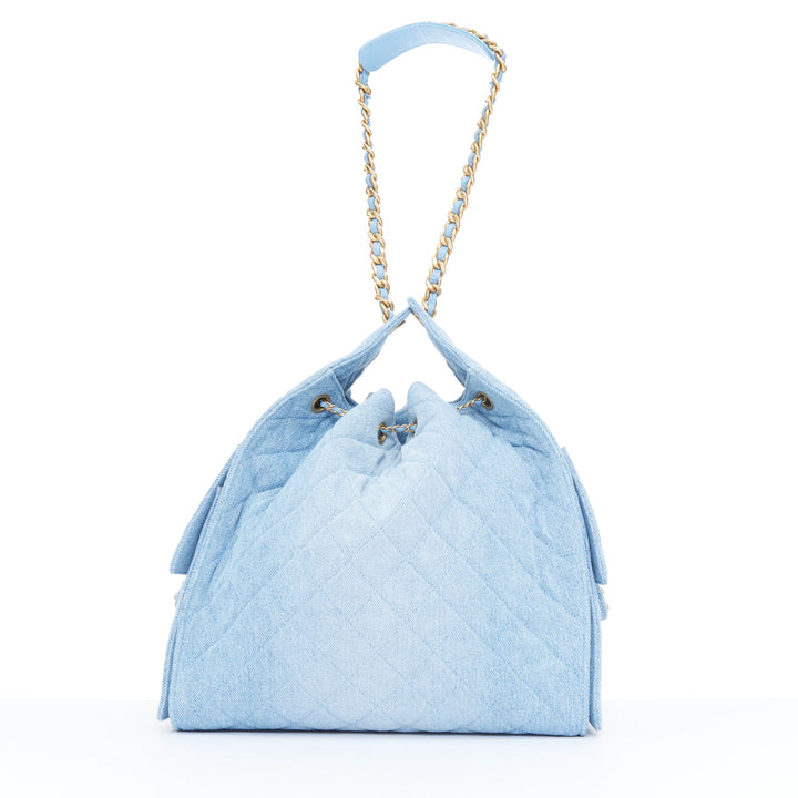 CHANEL Runway 25 Small light blue washed denim gold hardware bucket hobo bag