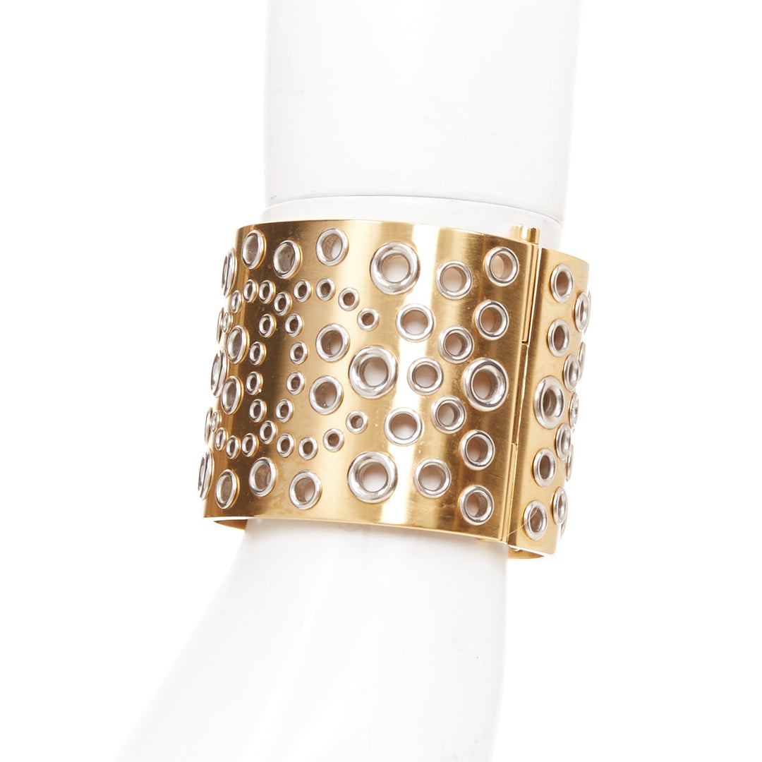 CHANEL B16 gold tone silver CC logo punctured grommet eyelet cuff bangle