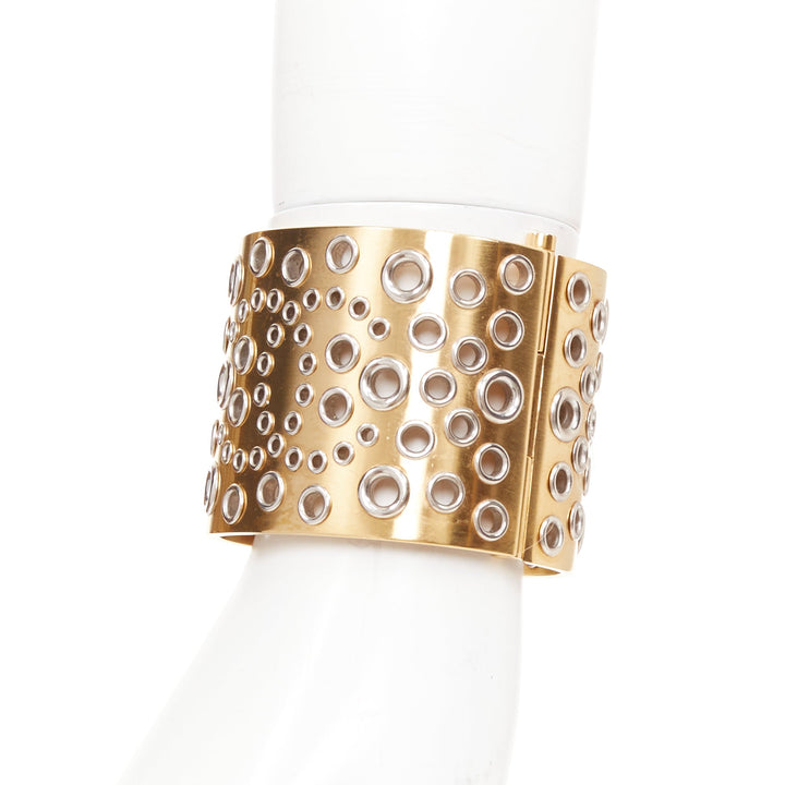CHANEL B16 gold tone silver CC logo punctured grommet eyelet cuff bangle