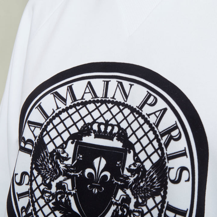 BALMAIN white cotton black flocked coin medallion logo raglan sweatshirt XXS