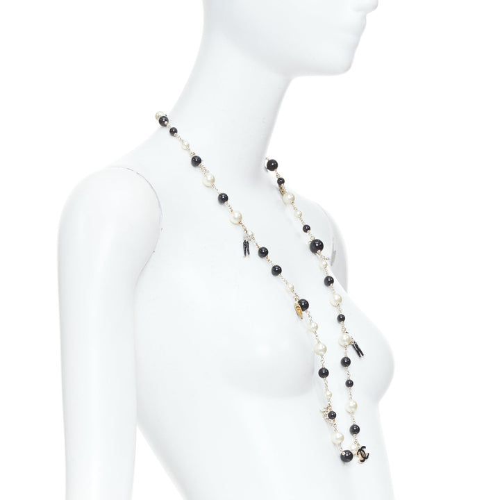 CHANEL 10C Runway CC Logo Faux Pearl Sautoir coco figurine charm necklace