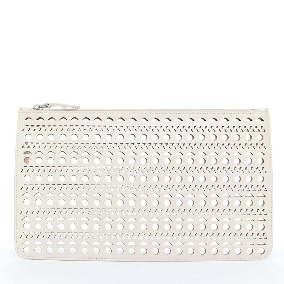 ALAIA Vienne laser cut tan beige neutral calfskin flat zip pouch clutch bag