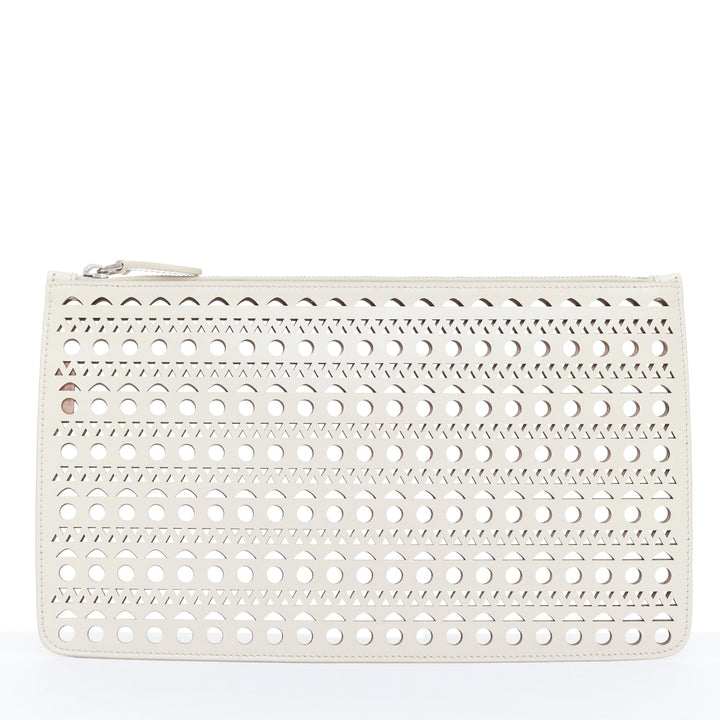 ALAIA Vienne laser cut tan beige neutral calfskin flat zip pouch clutch bag