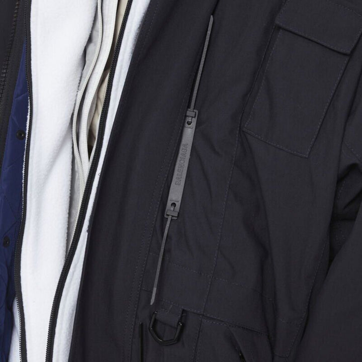 Male mannequin wearing Balenciaga by Demna Fall Winter 2018 Runway Black Nylon Men Coat in Size  L | Available at JHROP