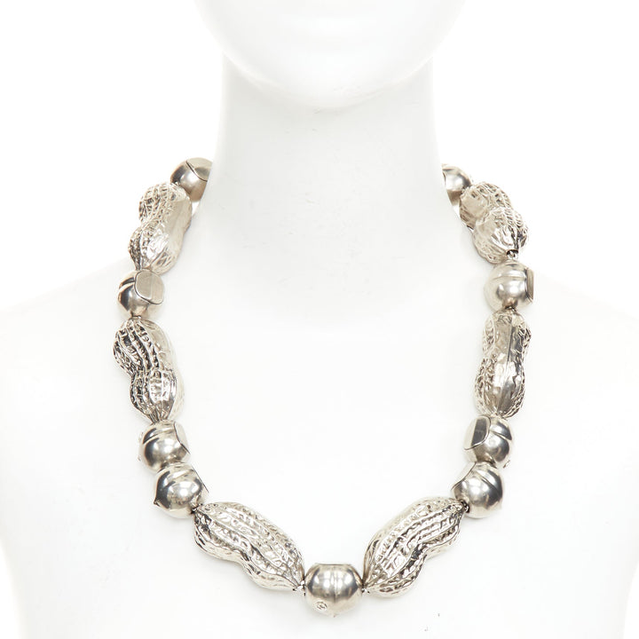 GUCCI Runway hazelnut peanut charm textured interlocking GG silver tone necklace