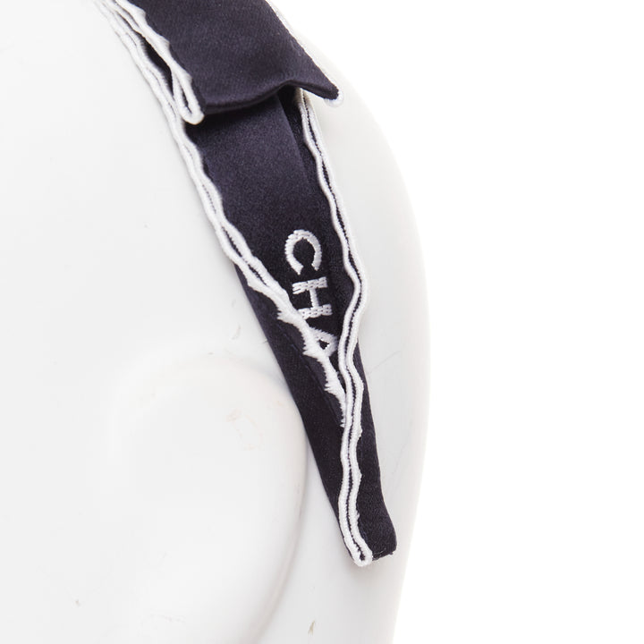 CHANEL 2023 black white CHANEL black white CC ribbon bow embellished alice hair