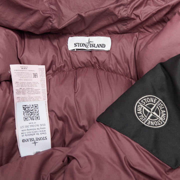 Male mannequin wearing Stone Island Purple Nylon Men Puffer Jacket in Size  M | Available at JHROP