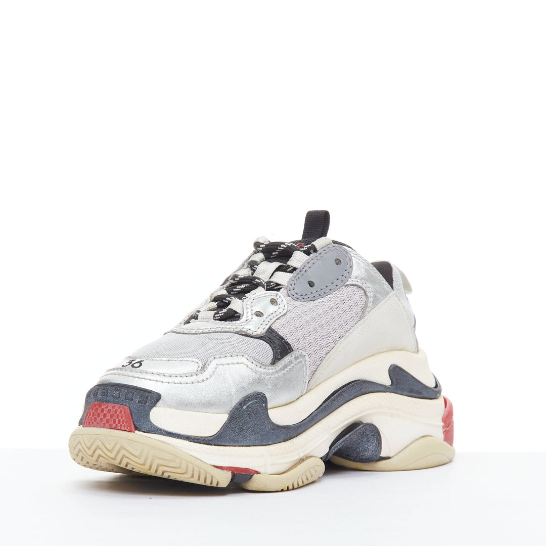 Female mannequin wearing Balenciaga by Demna Triple S Multicolour Leather Women Sneakers in Size EU36 | Available at JHROP