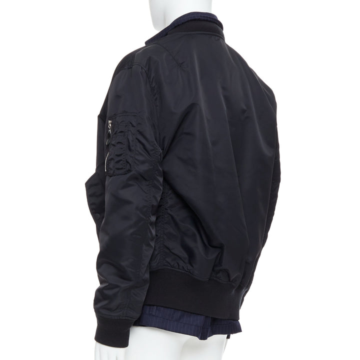 Male mannequin wearing Loro Piana Hiroshi Fujiwara Runway Black Feels like nylon Men Bomber Jacket in Size  XL | Available at JHROP