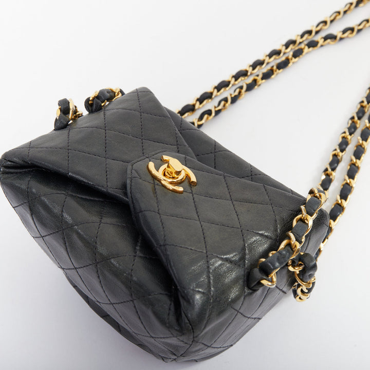 CHANEL 1990 Foldover Diamond Quilted dark grey lambskin mini bucket bag