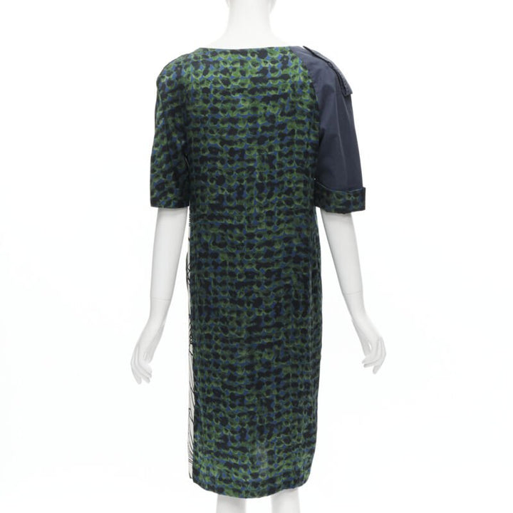 Female mannequin wearing Dries Van Noten Green Silk Women Cocktail Dresses in Size FR36 | Available at JHROP