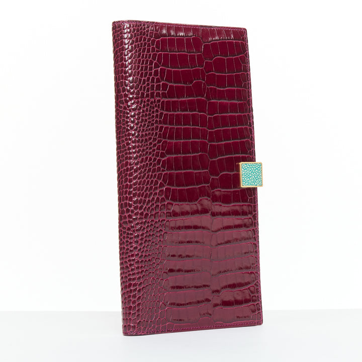 SMYTHSON Mara burgundy croc embossed high gloss teal clasp passport cover
