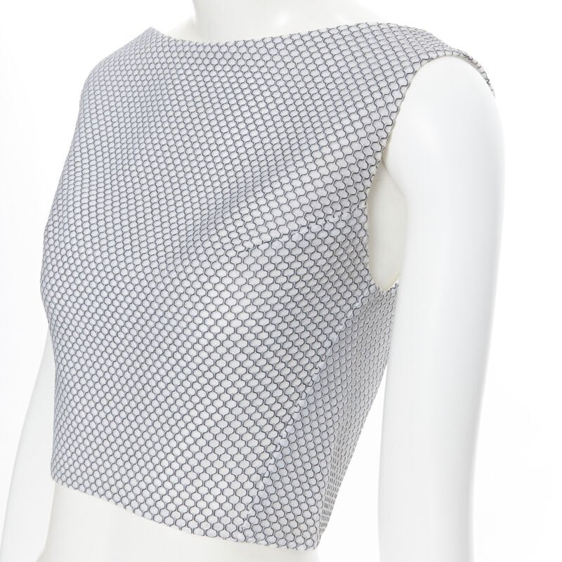 Female mannequin wearing Maticevski 2016 White Polyester Women Crop Top in Size  XS | Available at JHROP