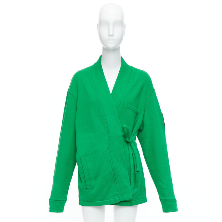 Female mannequin wearing Ambush WKSP Green Cotton Women Coat in Size  S | Available at JHROP