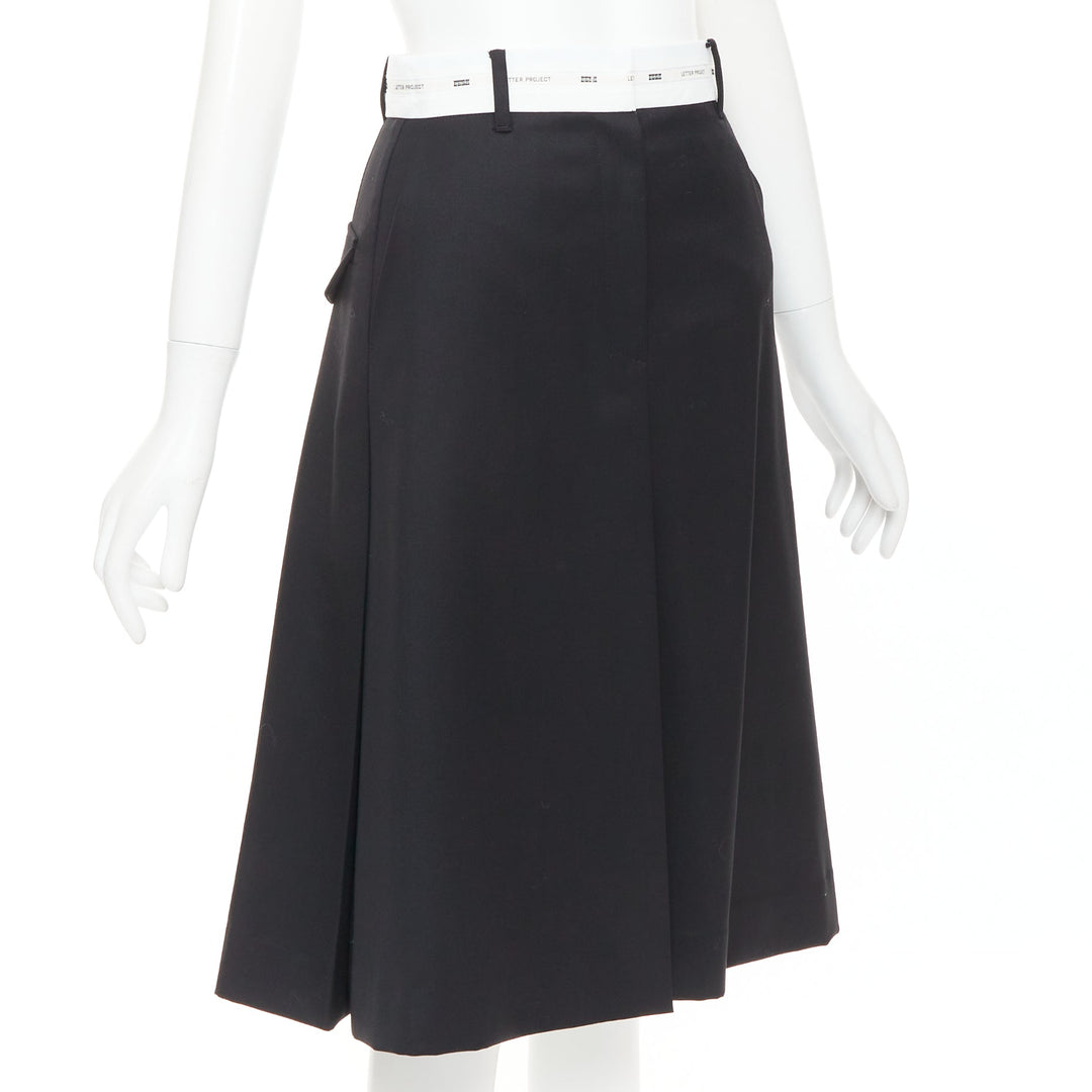 EENK LETTER X black white wool blend logo waist box pleat knee skirt XS