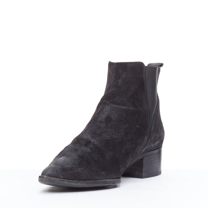 Female mannequin wearing Acne Studios Jensen Black Suede Women Boots in Size EU38 | Available at JHROP