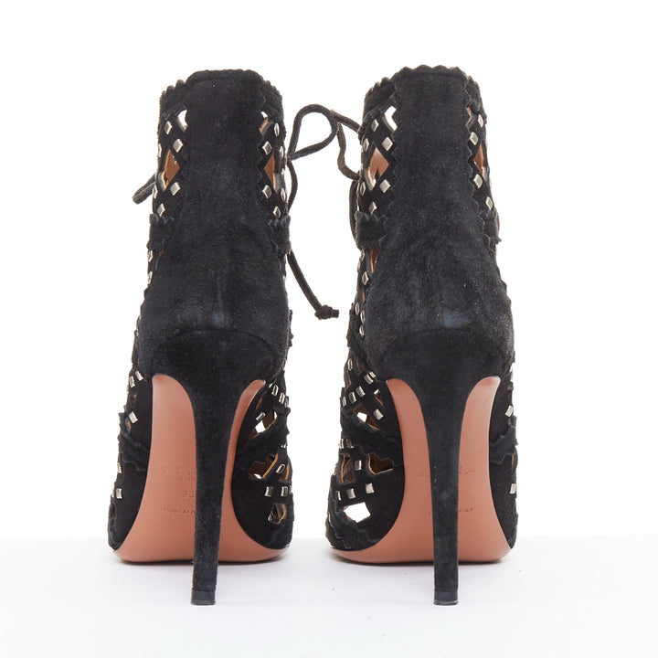 ALAIA black suede laser cut diamond lattice studded cage ankle booties EU35