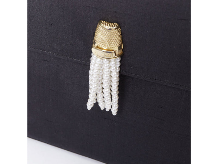 MOSCHINO 1990s Vintage black raw silk pearl gold handle tassel top handle bag