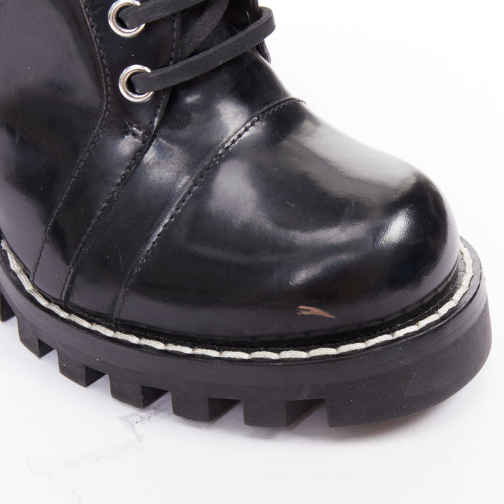 LOUIS VUITTON Star Trail black shiny leather logo tape army ankle boots EU40