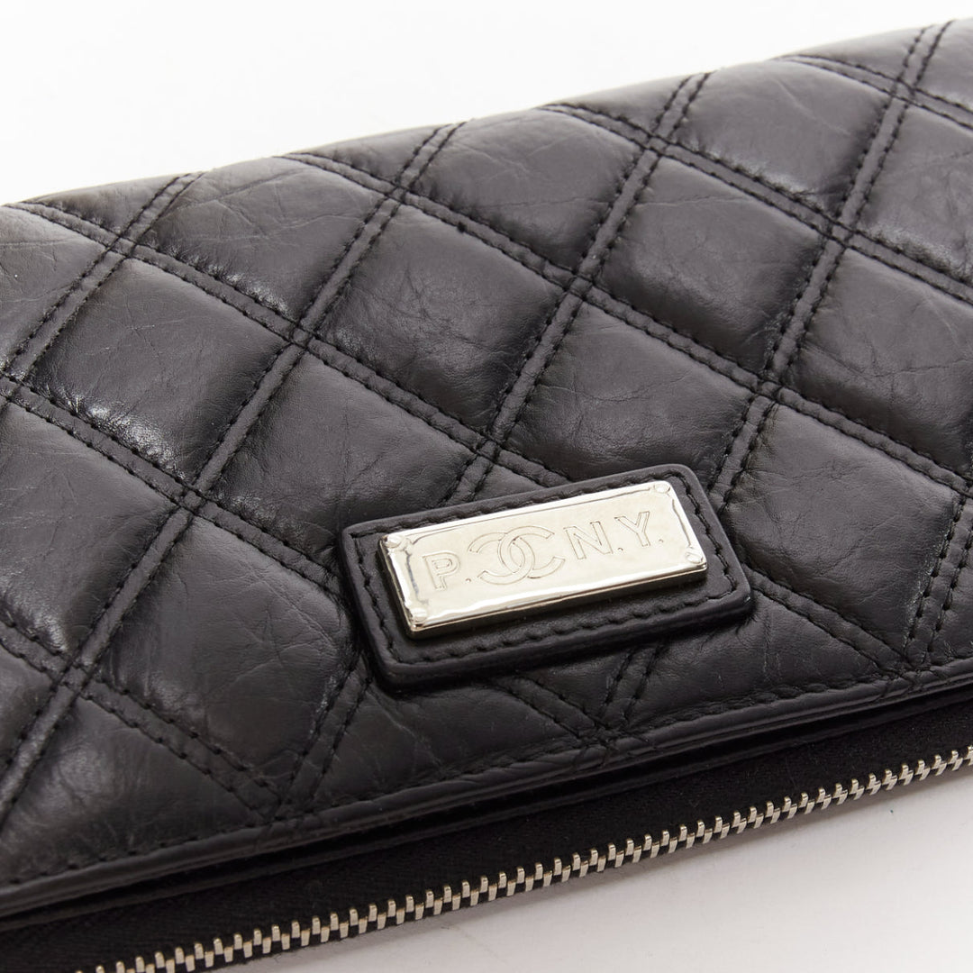 CHANEL Paris New York black quilted leather silver logo long zip wallet