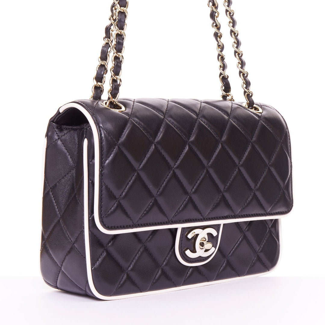 CHANEL 2025 Graphic Frame black quilted lambskin piping mini square flap bag