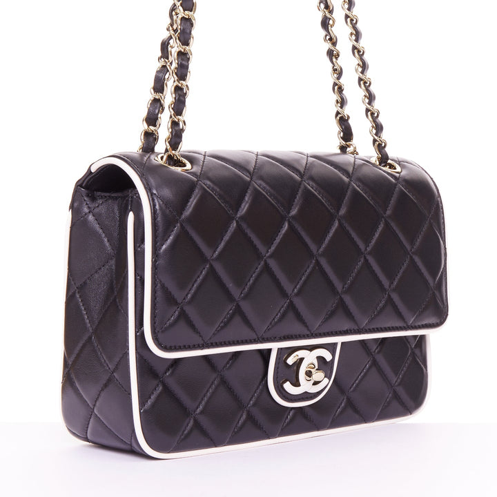 CHANEL 2025 Graphic Frame black quilted lambskin piping mini square flap bag