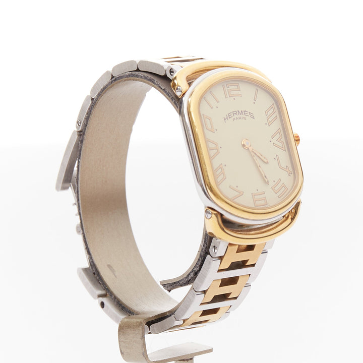 HERMES Rallye two-tone stainless steel gold plated saddle oval quartz watch