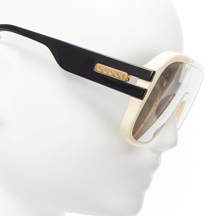 GUCCI GG0900S gold black logo cream frame black lens oversized shield sunglasses