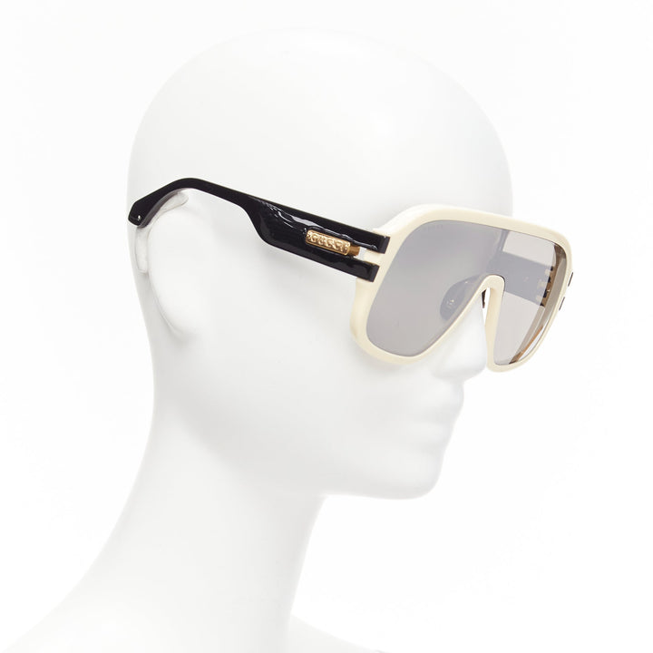 GUCCI GG0900S gold black logo cream frame black lens oversized shield sunglasses