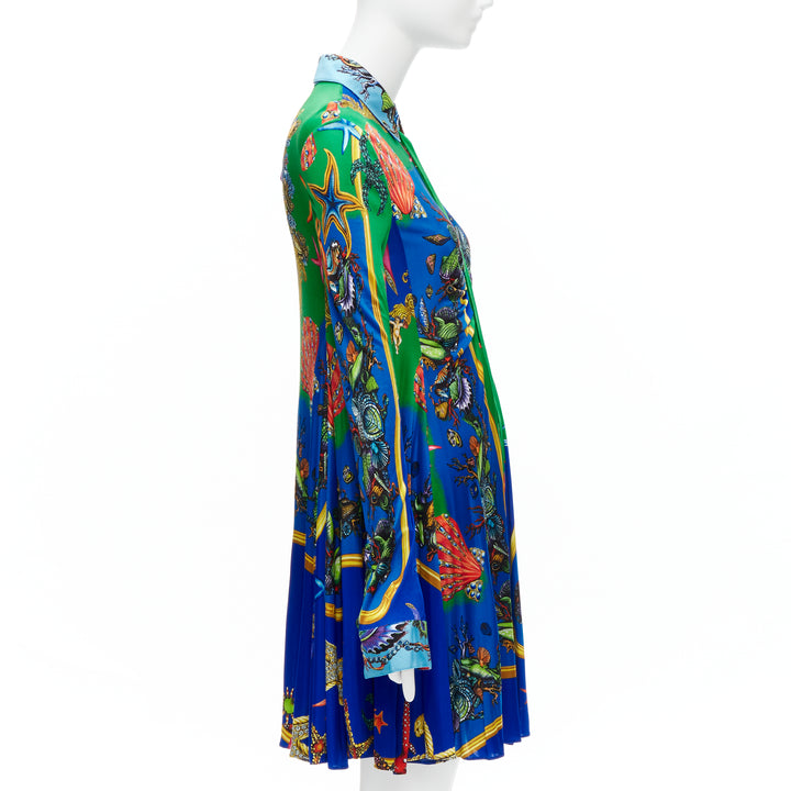 Female mannequin wearing Versace by Donatella Versace 2021 Tresor De La Mer Green Viscose Women Cocktail Dresses in Size IT44 | Available at JHROP