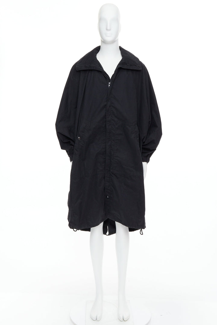 Male mannequin wearing Lemaire Black Cotton Men Coat in Size  3 | Available at JHROP