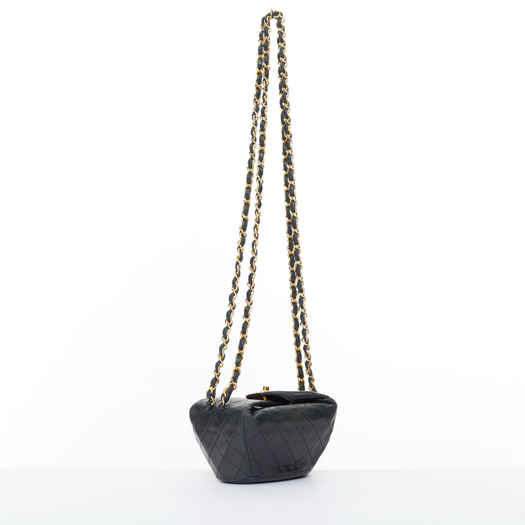 CHANEL 1990 Foldover Diamond Quilted dark grey lambskin mini bucket bag