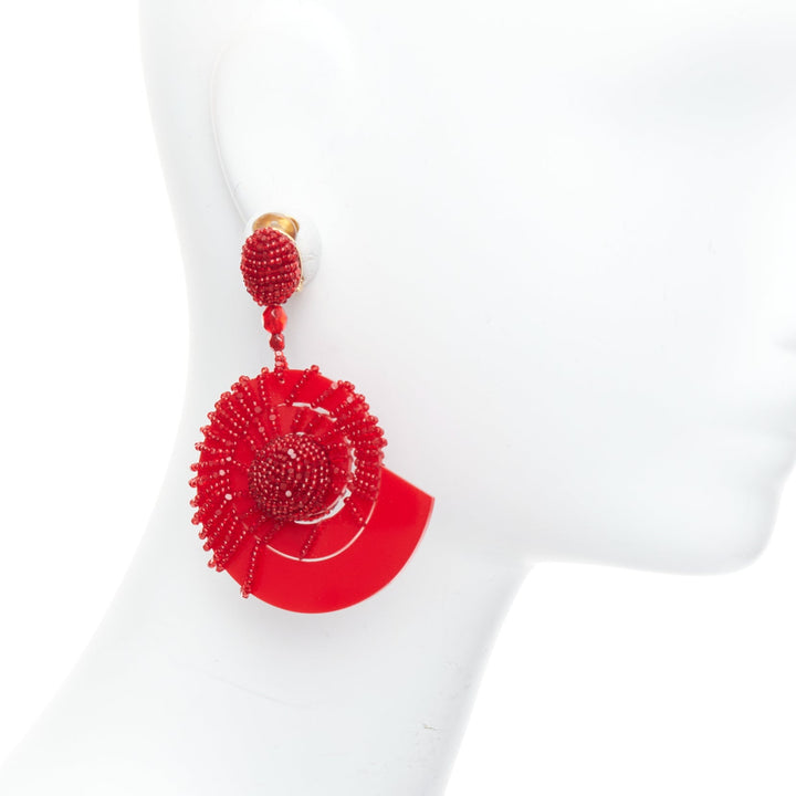 OSCAR DE LA RENTA red beaded acrylic spiral shell dangling clip on earrings pair