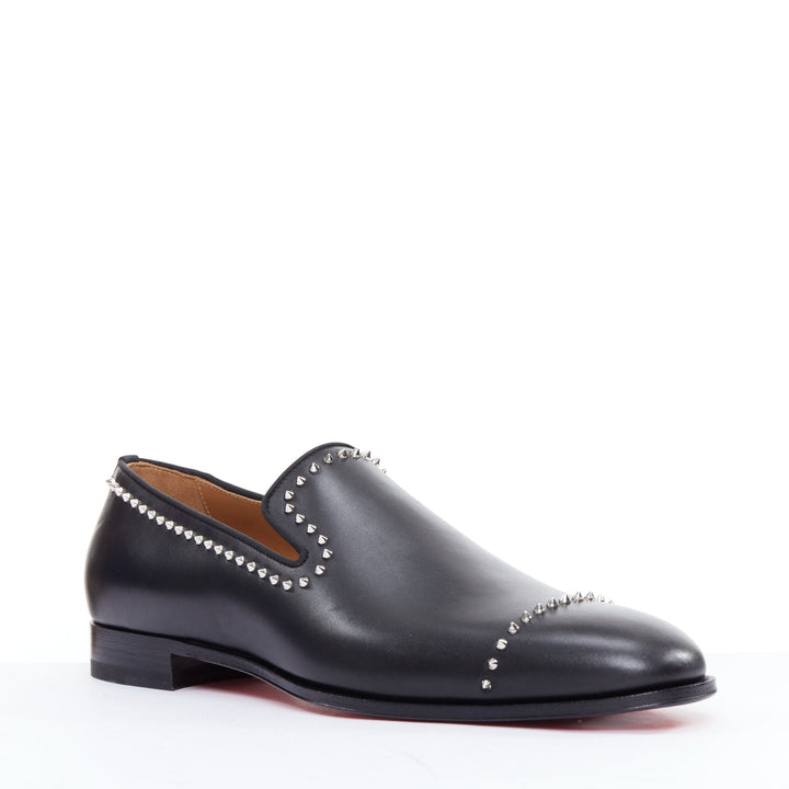 Male mannequin wearing Christian Louboutin Dandy Cloo Black Leather Men Loafer in Size EU43 | Available at JHROP