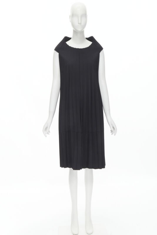 Female mannequin wearing Junya Watanabe 1998 Runway Black Cotton Women Cocktail Dresses in Size  S | Available at JHROP