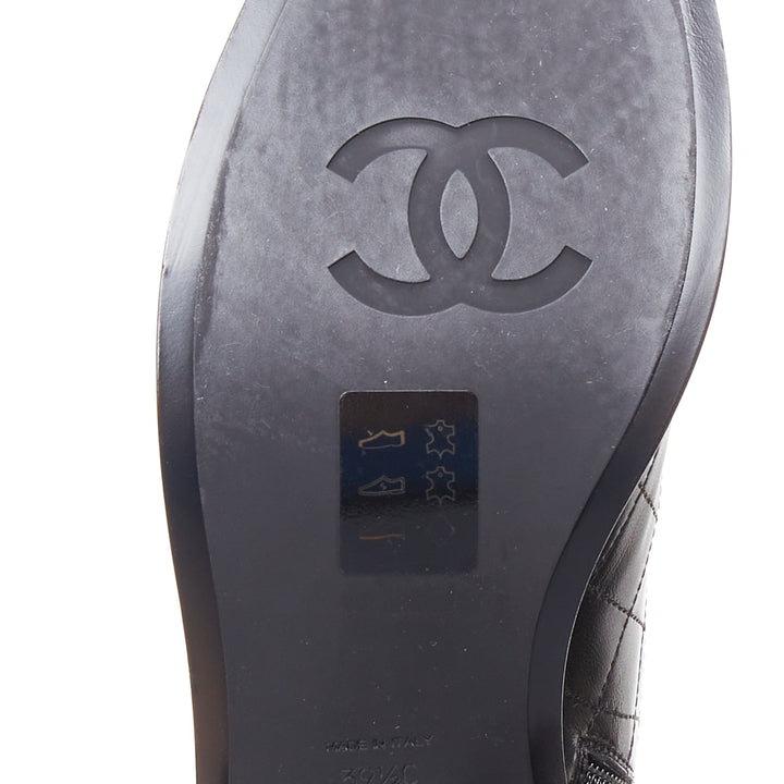 CHANEL 17A Paris Cosmopolite black lamb quilted pearl button ankle boots EU39.5