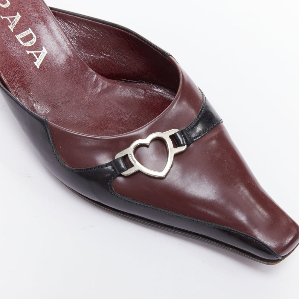 Female mannequin wearing Prada by Miuccia Prada Burgundy Leather Women Heels in Size EU36.5 | Available at JHROP