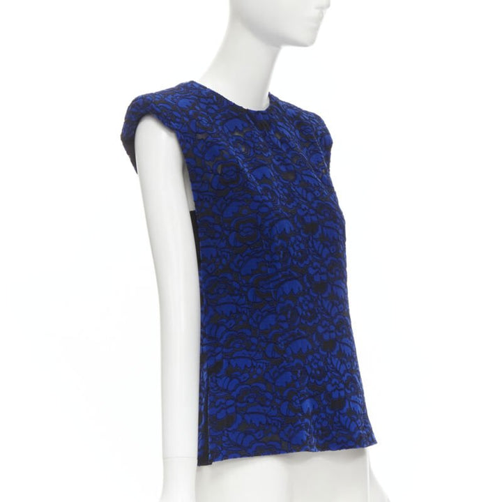 Female mannequin wearing Louis Vuitton by Nicolas Ghesquiere Spring Summer 2017 Runway Blue Velvet Women Top in Size FR36 | Available at JHROP