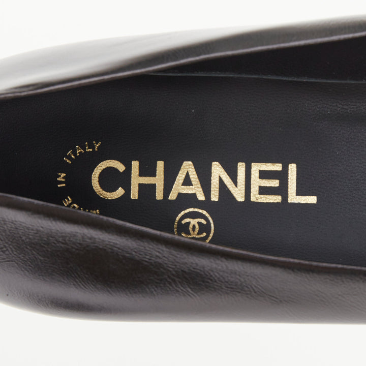 CHANEL 2021 black leather patent cap toe gold camellia block heel pumps EU39C