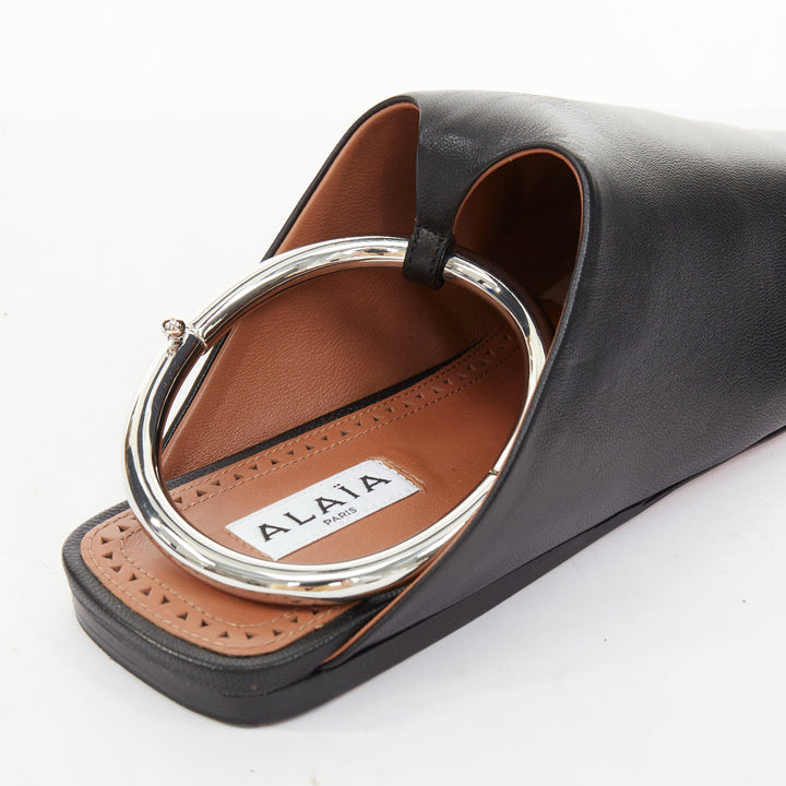 ALAIA 2022 Runway La Babouche black leather pointed toe ring slip on mules EU38