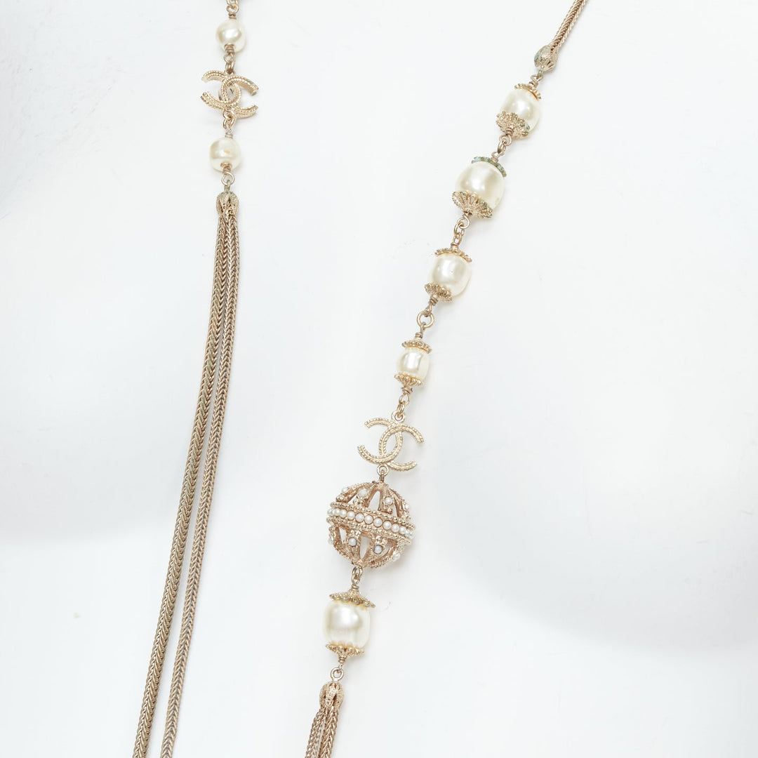 CHANEL B16A gold tone faux pearl CC logo round globes necklace