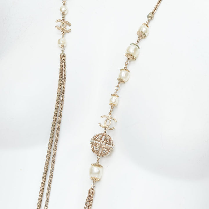 CHANEL B16A gold tone faux pearl CC logo round globes necklace