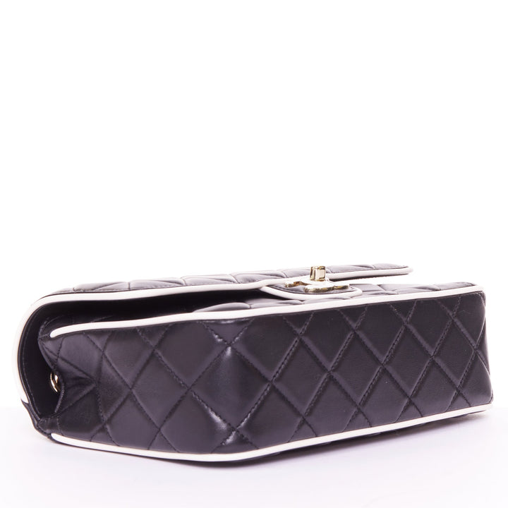 CHANEL 2025 Graphic Frame black quilted lambskin piping mini square flap bag
